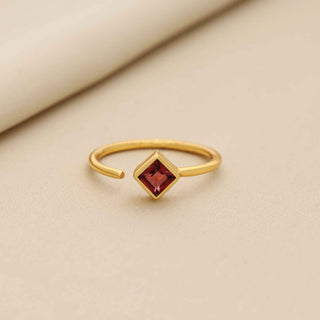 925 Silver Ring With 2 Micron 18 kt Gold Plated Decorated With Red Garnet Gemstone