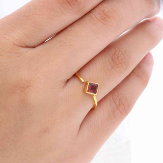 925 Silver Ring With 2 Micron 18 kt Gold Plated Decorated With Red Garnet Gemstone